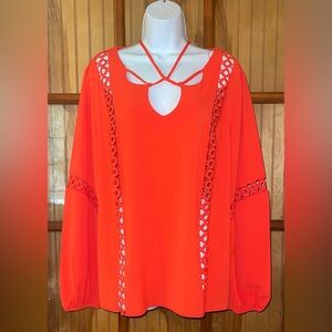 Vibrant Orange Top with Lace Accents